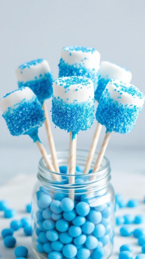 Blue Marshmallow Pops decorated with blue sprinkles on lollipop sticks