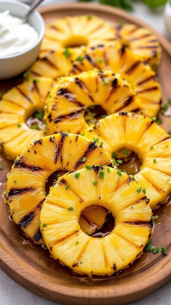 Grilled pineapple slices on a wooden platter with lime wedges and a bowl of cream.